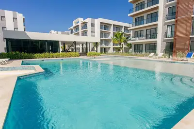 Image de 1 bedroom, artificial beach, swimming pool and gym