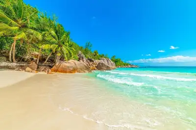 Seychelles Sun-Soaked Sailing: A Pristine Beach Experience from Praslin