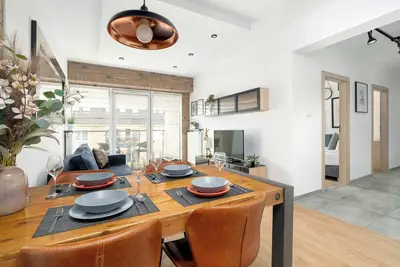 Image de Bóżnicza 1 Poznań | Modern Apartment | Parking | Balcony | 2 Bedrooms | City Center
