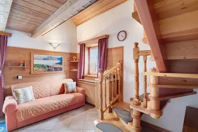 Image de Maison de vacances Baita sulle Alpi, vue montagnes, jardin, terrasse, barbecue et Wi-Fi.