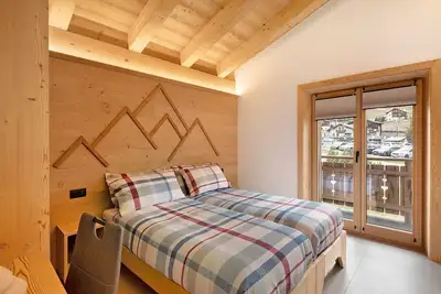 Image de Appartement 'Trilocale' avec vue sur la montagne, jardin commun et Wi-Fi