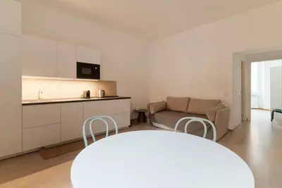 Image de Bright and comfortable 49 square meters apartment, perfect for four people, located on the first floor of a tenement building (No elevator). The property is located in a lively area with excellent connections to both the city center and the Centrale and G