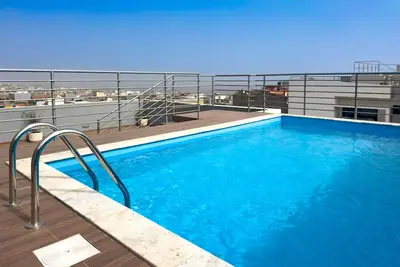 Image de Cozy 2-bdr apt, Cidadela - rooftop pool - Lcgr