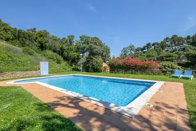 Image de Maison mitoyenne avec vue sur la mer et piscine commune