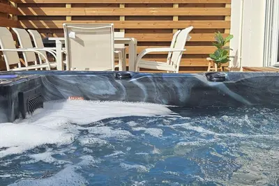 Image de Maison 3ch Terrasses Jacuzzi Jardin à 4min de la plage.