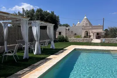 Image de Complex of trulli and lamie in Itria Valley - charm and relaxation by the pool