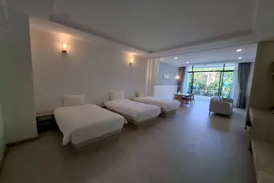 Image de Chambre familiale confortable avec terrasse à 100 mètres à pied de la plage d'Ao Nang