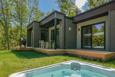 Image de Bel Air Tremblant Andorra Famille: 1 King, 2 Lits SUPERPOSÉS, Jacuzzi