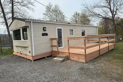 Image de Chalet auf Campingplatz
