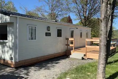 Image de Chalet auf Campingplatz