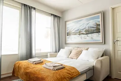Image de Cozy City Apartment with Private Sauna and Parking