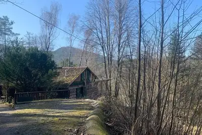 Image de Maison de vacances 'Waldhütte' avec vue sur la montagne, terrasse privée et Wi-Fi