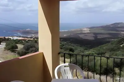 Image de Appartement 'Sea View Isola Rossa' avec Vue Mer, Wi-Fi et Climatisation
