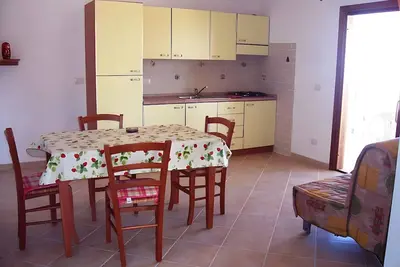 Image de Appartement 'Sea View Isola Rossa' avec Vue Mer, Wi-Fi et Climatisation
