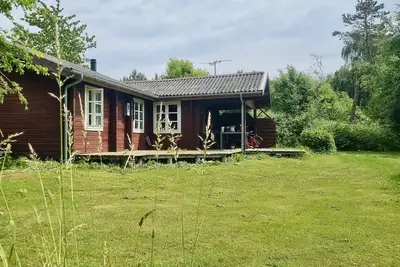 Image de Ferienhaus auf Naturgrundstück mit Ofen, Tischfußball und zwei Terrassen