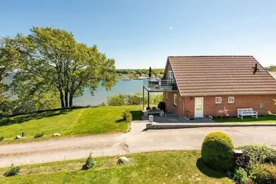 Image de Ferienhaus mit Panoramablick, Privatstrand und einzigartiger Meerlage