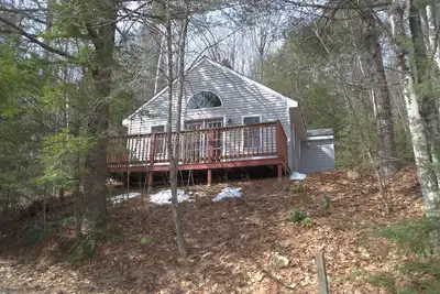 Image de 1 bedroom cottage with queen bed and 2 person whirlpool tub.