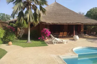 Image de Superbe villa avec piscine privée & jardin arboré à 500m de la plage à Nianing