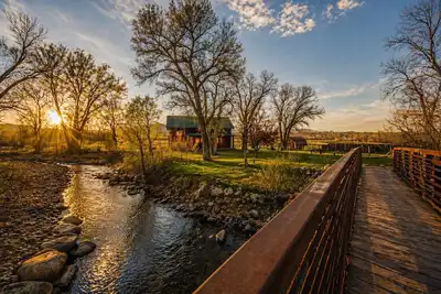 Image de Clear Creek Crossing | Mountain Cabin on the Creek with Private Bridge Entry, Blm Land, Stargazing Deck + Separate Garage Apartment | Buffalo Wyoming Near Bighorn Mountains