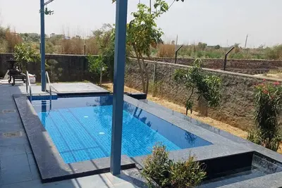 Image de 2bhk villa in 16k sqft farmhouse wth view f mini forest nd arawali mountain rnge