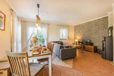 Image de Semi-detached house in Kachlin with sauna, fireplace and garden