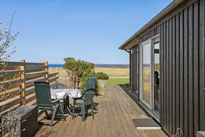 Image de Maison de 3 chambres en bord de mer à Asperup