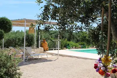 Image de Cozy medieval trullo for couples and families seeking tranquility.