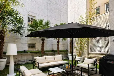 Image de Appartement luxe • Jardin privé 150m² • Verrière • Tour Eiffel