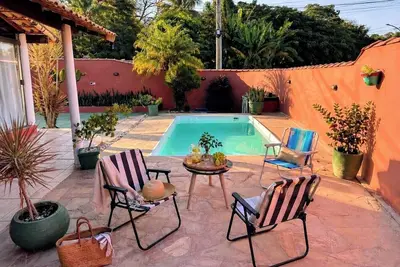 Image de Retreat In MARICÁ: Sunset Pool And Deck.