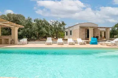 Image de Appartement « Dimora Il Melograno » avec piscine partagée, Wi-Fi et climatisation