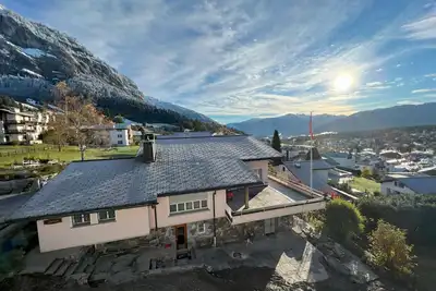 Image de Residenza Cristallo, (Flims Dorf). 3. 5 Zimmer Partérre Wohnung (97m2) mit Garte by Interhome