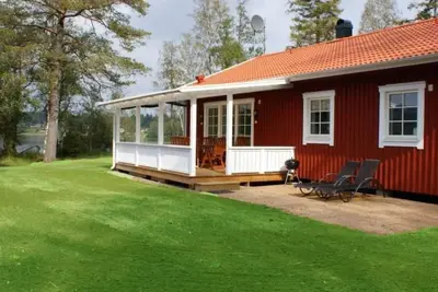 Image de Gemütliches Holzhaus Udden mit eigenem Boot by Interhome