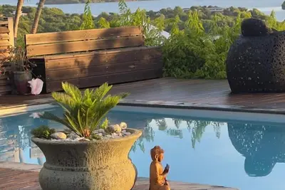 Image de Maison créole bois, vue mer incroyable, piscine, 2 ch clim- Les Palmiers Rouges