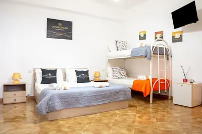 Image de Chambre quadruple avec salle de bain privée
