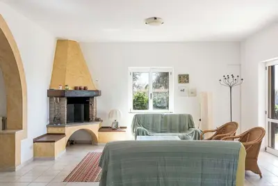 Image de Merveilleuse maison de vacances privée pour 8 personnes avec Wifi, terrasse et animaux admis