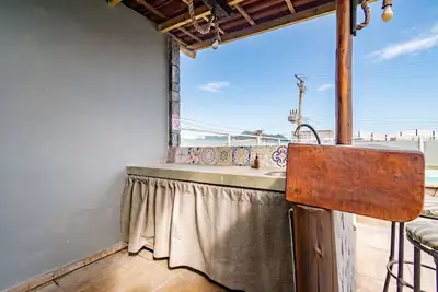 Image de Casa para 12 em Itajaí | Piscina e Churrasqueira