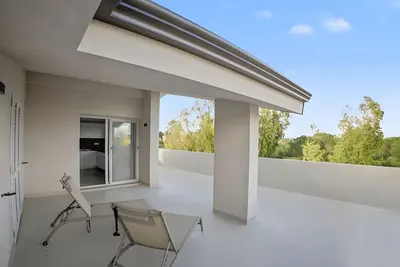 Image de Appartement « Cala – Terrasse avec vue sur mer » à 150 m de la plage de Budoni