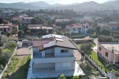 Image de Appartement « Bleu avec Patio » avec terrasse privée à 3 min à pied de la plage de Budoni