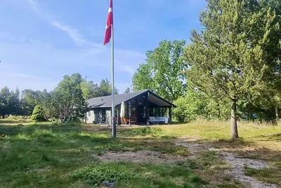 Image de Ferienhaus mit drei Terrassen, großer Fensterfront und Strandnähe