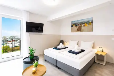 Image de MEERholung FeWo 1. 10 beachfront 1-room apartment with balcony