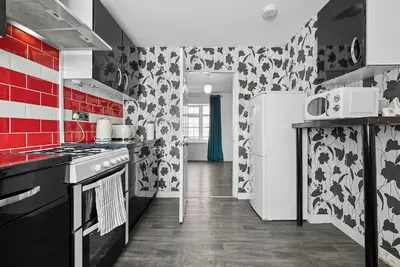 Image de Cozy 3 bedroom house w/free parking &near hospital