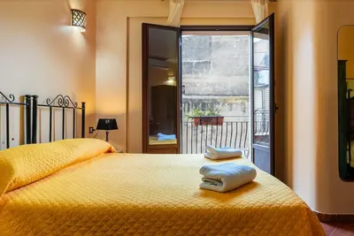 Image de Chambre 'B&B San Domenico - Quadruple Supérieure' avec balcon, Wi-Fi et climatisation