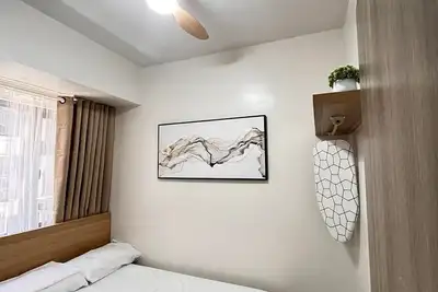 Image de Cozy 1-bedroom condo with Ac in serene Pasay City