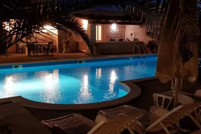 Image de Wohnung mit Schwimmbad by Interhome