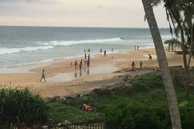Image de Doppelhaushälfte YANg der Villa Kandu, direkt am Strand von Hikkaduwa in Sri La by Interhome
