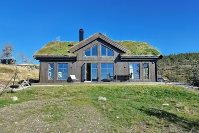 Image de Nouveau chalet de montagne avec vue sur Eggedal