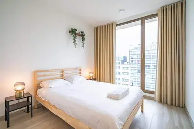 Image de Retraite citadine haut de gamme avec balcon