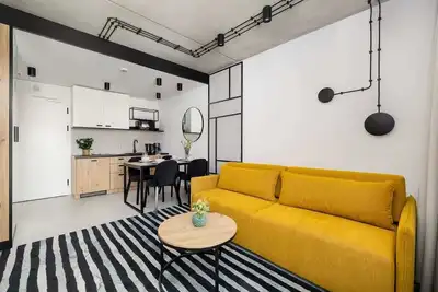 Image de Stylish Apartment near the Beach | Green Port | Swimming Pool | Sauna | Gym
