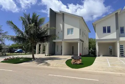 Image de #2   2-bedroom condo in serene Savannah with refreshing Ac