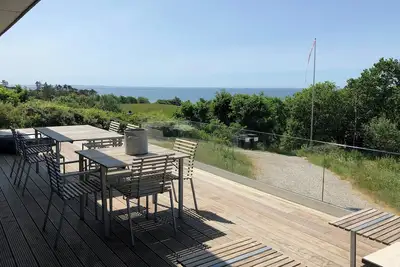 Image de Maison minimaliste avec vue sur la mer à Helgenæs